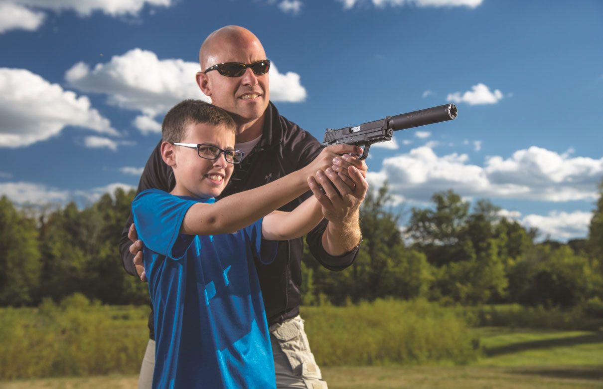 Using a suppressor while shooting can help protect your hearing. (Photo courtesy of 'Shooting Times')